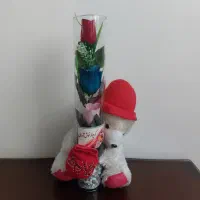 گل مصنوعی شیشه ای با عروسک