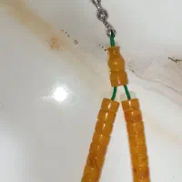 تسبیح کهربا بودار رگه دار|کلکسیون اشیاء عتیقه|سلماس, |دیوار