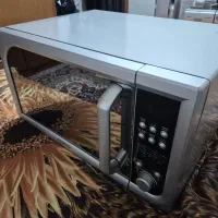ماکروویوکنوود(درب اینه ای) درحداک
