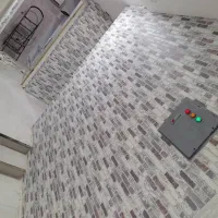 نصاب کاغذ دیواری بتونه کاری پوستر چمن مصنوعی موکت