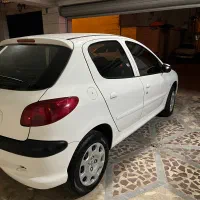 206 سفید مدل 1400|خودرو سواری و وانت|رشت, معلم|دیوار