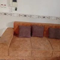 یک دست مبل ال هفت نفره با یک پافر