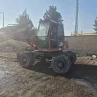 بیل مکانیکی لاستیکی