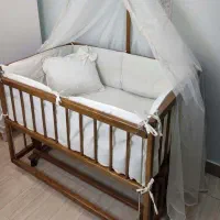 تخت کنار مادر گهواره ای