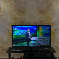 تلوزیون ایکس ویژن ۴۲ اینچ همراه با میز