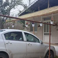 ویلایی-نقلی-روستایی-در-بافت-مسکونی-بر-جاده-اصلی
