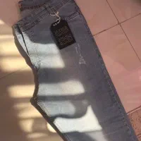 شلوار جین اتیکت دار