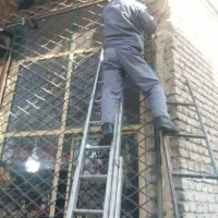 کرکره قدیمی تعمیرات فنرکرکره درب اتوماتیک برقی