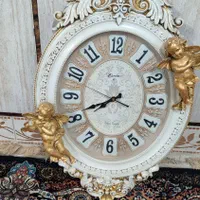 ساعت دیواری و چرخ خیاطی مارشال