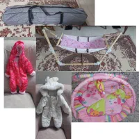 گهواره و لباس بچه
