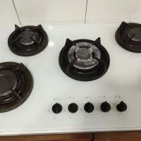 اجاق گاز پنج شعله صفحه ای شیشه ای سفید اخوان