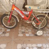 دوچرخه سایز ۱۲  کمکی هم دارد