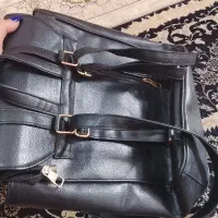 تعدادی لباس در حد نو