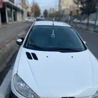 206 اس دی V8 سفید مانیتور دار کارکرد واقعی