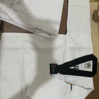 وسایل تکواندو نو(دستکش روپایی لباس کمربند کلاه)