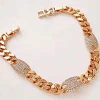 دستبند زنجیری نگین دار کارتیر ژوپینگ طلایی