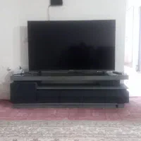 یک عدد نلویزیون اندروید دوو۵۵ اینچ همراه با میز|تلویزیون و پروژکتور|خمینیشهر, |دیوار