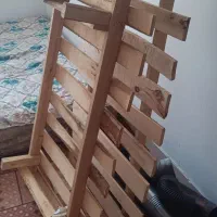کفی تخت دو نفره و قفس پرنده
