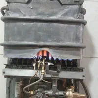 ابگرمکن دیواری بوتان 3115 درحد سرویس کامل شده