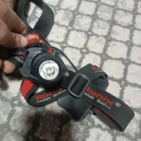 چراغ پیشانی رونیکس باطری خور نو