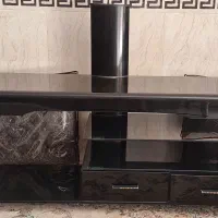 میز شیشه ای تلویزیون