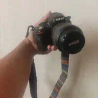 دوربین عکاسی و فیلم برداری نیکون با لنز ۵۵.۸۰