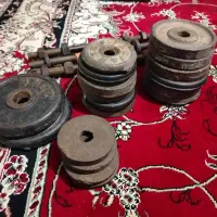 مجموعا 22 کیلو وزنه دمبل بهمراه 3 عدد دسته دمبل