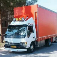کارگر و کامیون اثاثیه منزل لکستان بارساوه