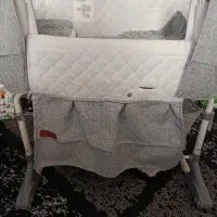 گهواره کنار تخت مادر