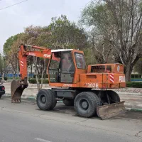 بیل مکانیکی اطلس ۱۳۰۲