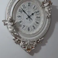 ساعت دیواری طرح فرشته برجسته