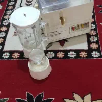 ابمیوه گیر و جا ادویه در حد نو