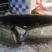 دو عدد چراغ جلو پژوپارس با لامپ جلو پنجره