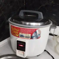 پلوپزوبخارپزوتعدادی ظروف سفالی وشیشه ای