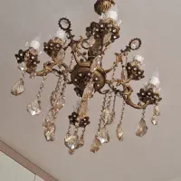 یک عددلوستر و  یک عددساعت برنزی