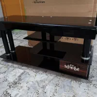 میز تلویزیون شیشه‌ای