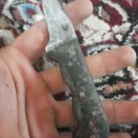 تسبیح و انگشتر و چاقو