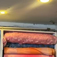 تعدادی طاقه پارچه پرده