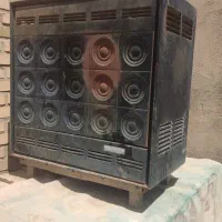 بخاری نفتی قدیمی  و لباسشویی