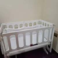 تخت و گهواره کنار مادر|تخت و صندلی بچه|دوگنبدان, |دیوار