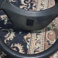 غربیل فرمان پژو و یک جفت هدلایت