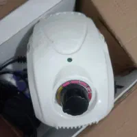 دستگاه کاشت ناخن