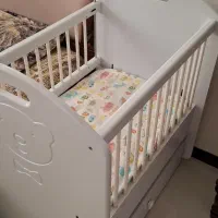 گهواره کنار مادر|تخت و صندلی بچه|بیرجند, |دیوار