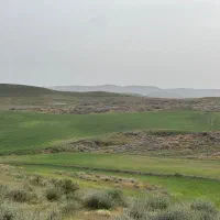 ۹هکتار زمین سند دار ملکی حاشیه جاده قدیم ملک آباد