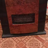 دو عدد بخاری سه عدد صندلی