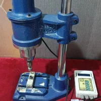 دستگاه پانچ دکمه زن