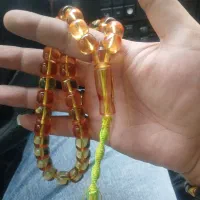 تسبیح سندلوس اب حیات زعفرانی نخ نما معطر و خوش صدا