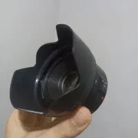 لنز کنون 50mm f1.8 STM به همراه هود