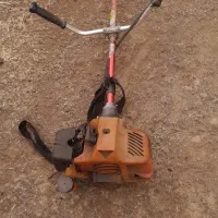 علف زنی با علف تراش هرس موتور چوب بری و اره
