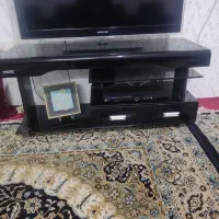 میز تلویزیون شیشه‌ای